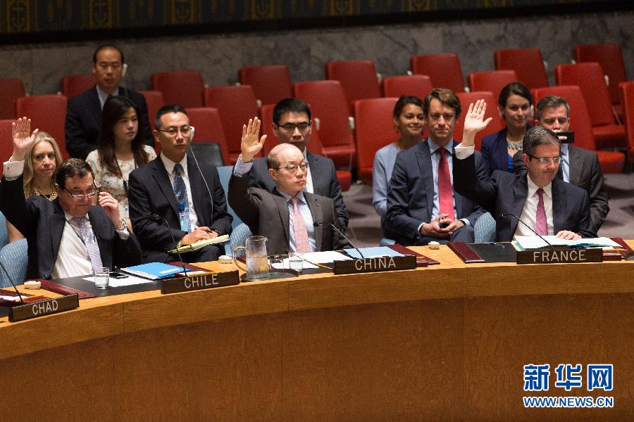 Photo taken on July 20, 2015. Liu Jieyi (sitting in the middle of the front row), China&apos;s Permanent Representative to the United Nations, raises his hand to vote on the UN Security Council resolution concerning the Iranian nuclear issue. [Photo/Xinhua]