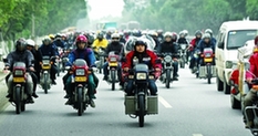 100,000 migrant workers motorbike home