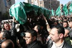 Palestinian mourners attend the funeral of Mahmoud al-Mabhouh, one of the founders of the Islamic movement's armed wing known as Izzedein al-Qassam Brigades, in Damascus, Syria, Jan. 29, 2010. Hamas vowed on Friday to retaliate the assassination of its top military commander Mahmoud al-Mabhouh in Dubai after it blamed Israel for his death. [Bassem Mohamad/Xinhua]