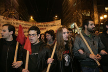 Greek demostrators shout slogans during a protest march against the austerity measures announced by the government in central Athens, capital of Greece, March 4, 2010. The Greek government ruled out on Thursday any possibility of backing off from an austerity plan it announced on Wednesday to fight the deficit, despite a string of protests against the measures.[Marios Lolos/Xinhua] 