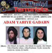 In this Oct. 11, 2006 file photo, a wanted poster of Adam Yahiye Gadahn is displayed at the Justice Department in Washington. Pakistani officials say Adam Gadahn, the American-born spokesman for al-Qaida, has been arrested Sunday March 7, 2010. [Xinhua]