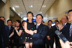 Liu Qibao(C), Party chief in southwest China's Sichuan Province, arrives in Taipei, southeast China, May 23, 2010. Liu Qibao, leading a delegation for exchange activities in the areas of economy, finance, education and culture, will visit Taiwan from May 23 to 28 at the invitation of the Kuomintang (KMT). 