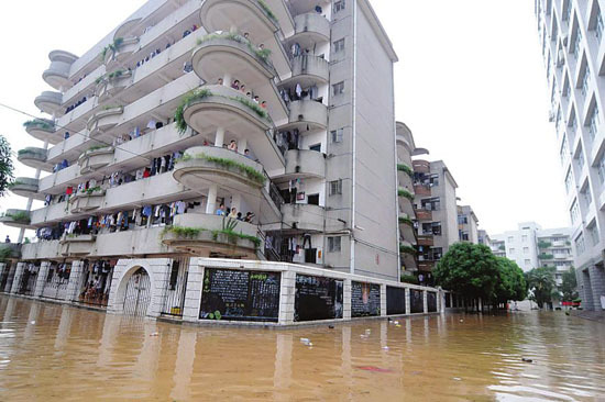 The Guangxi International Business Vocational College is flooded after a rainstorm on June 15, 2010.