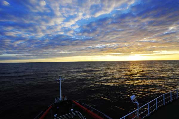 China&apos;s icebreaker Xuelong (Snow Dragon) sails on the northwest Pacific Ocean on Sunday. [Xinhua]