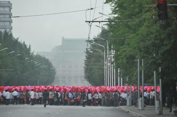 Pyongyang citizens attend a celebration ceremony rehearsal for the upcoming Conference of Workers' Party of Korea (WPK) in Pyongyang, capital of the Democratic People's Republic of Korea (DPRK), Sept. 5, 2010. The Political Bureau of the Central Committee of the WPK has announced that a conference of the WPK will be held in early September to elect its highest leading body. [Gao Haorong/Xinhua]