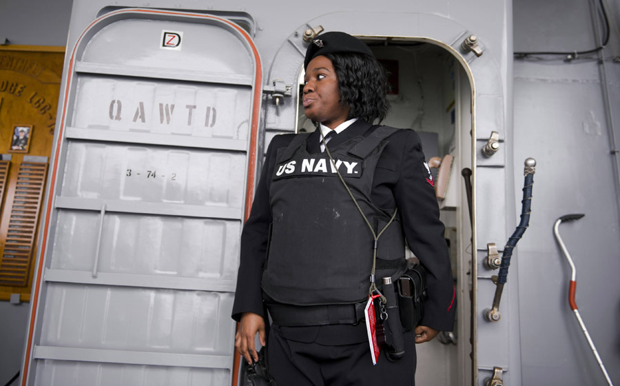 A female marine soldier performs duties on the Blue Ridge on February 19, 2010. The USS Blue Ridge, flagship for the Commander of the U.S. Navy's 7th Fleet, started its five-day port visit in Hong Kong on Saturday. Carrying more than 1,400 crews on board, the 194-meter Blue Ridge, with a tonnage of over 19,000 tons, has been in service for about 40 years. [Xinhua]