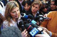 The lawyer of Karima El Mahroug, Paola Boccardi (L), speaks to the press in front of Milan justice court during the first hearing of the 'Ruby the Heart Stealer' case's trial on April 6, 2011. Italian Prime Minister Silvio Berlusconi's trial on charges of sex with an underage prostitute, Karima El Mahroug, nicknamed 'Ruby the Heart Stealer', and abuse of power, opened and was immediately postponded by judges to May 31. [Xinhua]