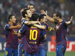 Barcelona's Cesc Fabregas (2nd L) celebrates his goal against Porto with his teammates during their European Super Cup soccer match at Louis II stadium in Monaco, August 26, 2011. [Xinhua/Reuters Photo]