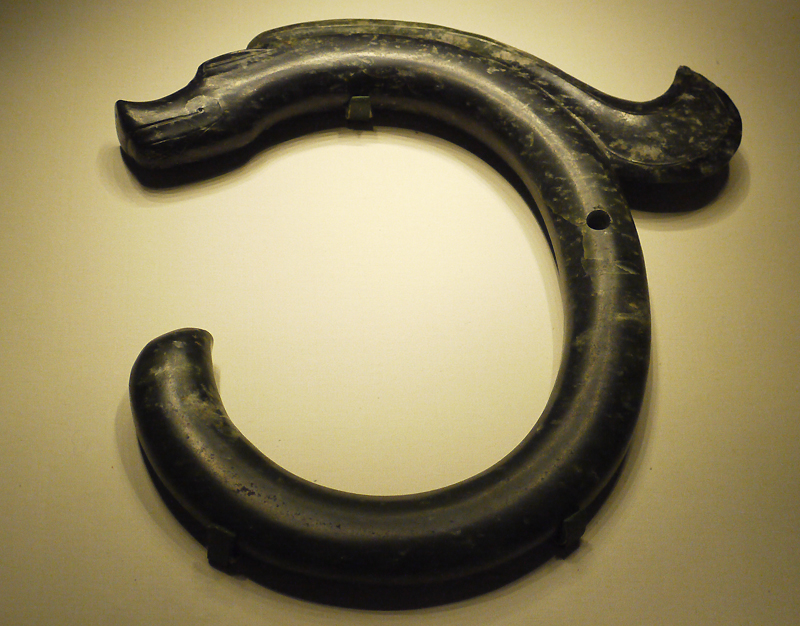 Jade Dragon, Hongshan Culture (c. 4700-2900 BC), unearthed at Saiqintala, Ongniud Banner, Inner Mongolia Autonomous Region, 1971. It is exhibited in the section of Life and Production in Neolithic China, an exhibition of Ancient China in the National Museum of China. [Photo by Xu Lin / China.org.cn]