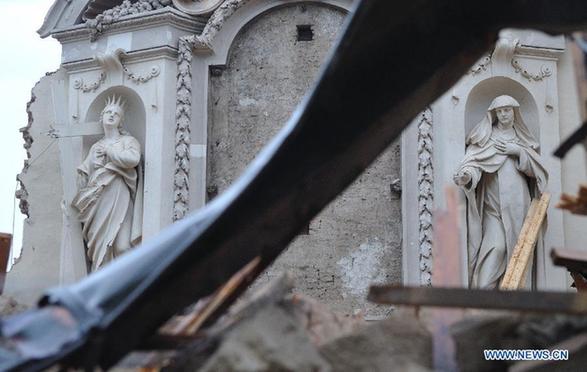 A collapsed oratory is seen at San Carlo in the Emilia-Romagna region, northern Italy, May 20, 2012. Death toll of a 5.9-magnitude earthquake that hit northern Italy in the early hours of Sunday morning has risen to 7. The quake also damaged many historic buildings in this area. [Wang Qingqin/Xinhua] 