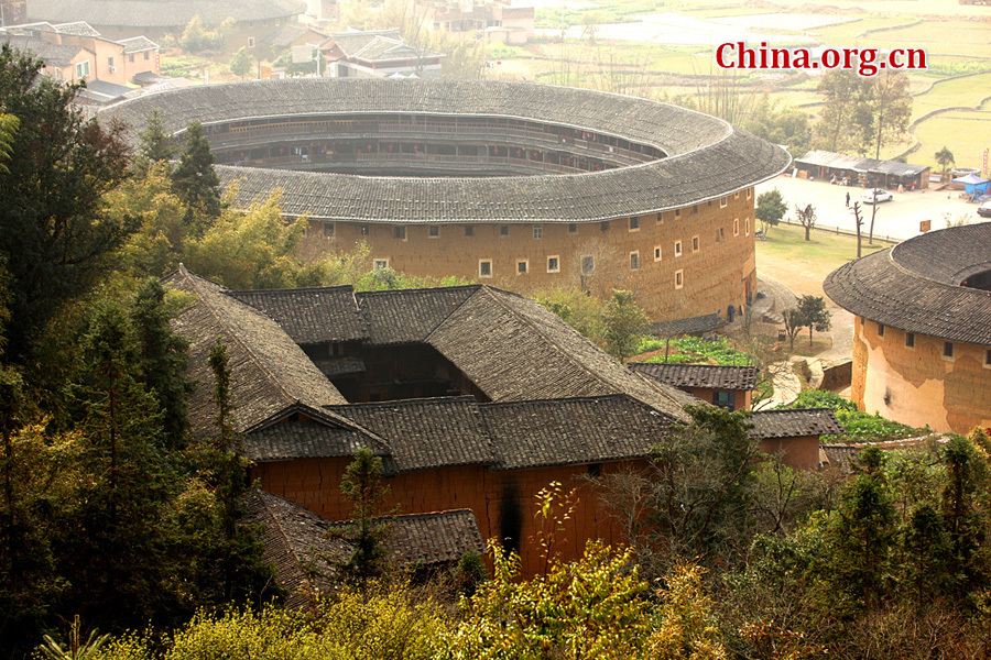 Built on a base of stone, the thick walls of Tulou were packed with dirt and fortified with wood or bamboo internally. The architectural arts of the Fujian Tulou can be traced back nearly 1,000 years, and their design incorporates the tradition of fengshui (favorable siting within the environment).