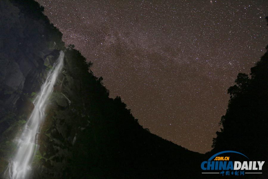 The Moon Waterfall is a landmark of the Dulong River Valleys. [Photo by Peng Jiansheng/For China Daily]